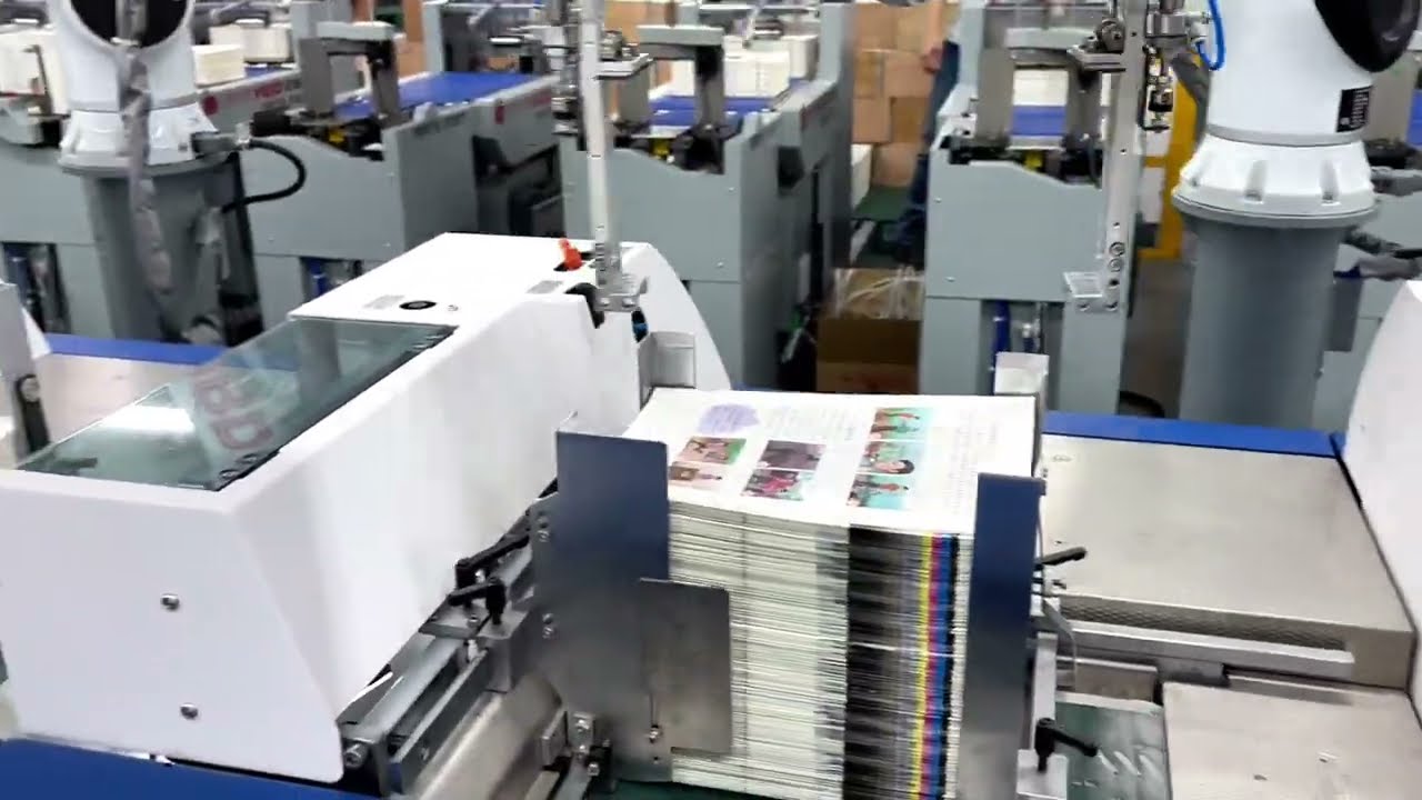 Robot in Textbook Production – JMD Sunbridge Perfect Binding System with High Speed and Intelligence