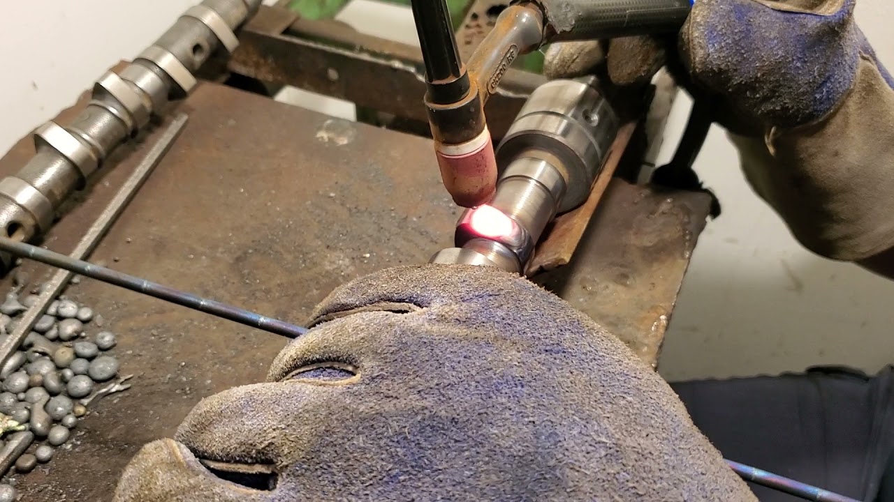Hardface welding on MGB camshaft  Deltacam.com
