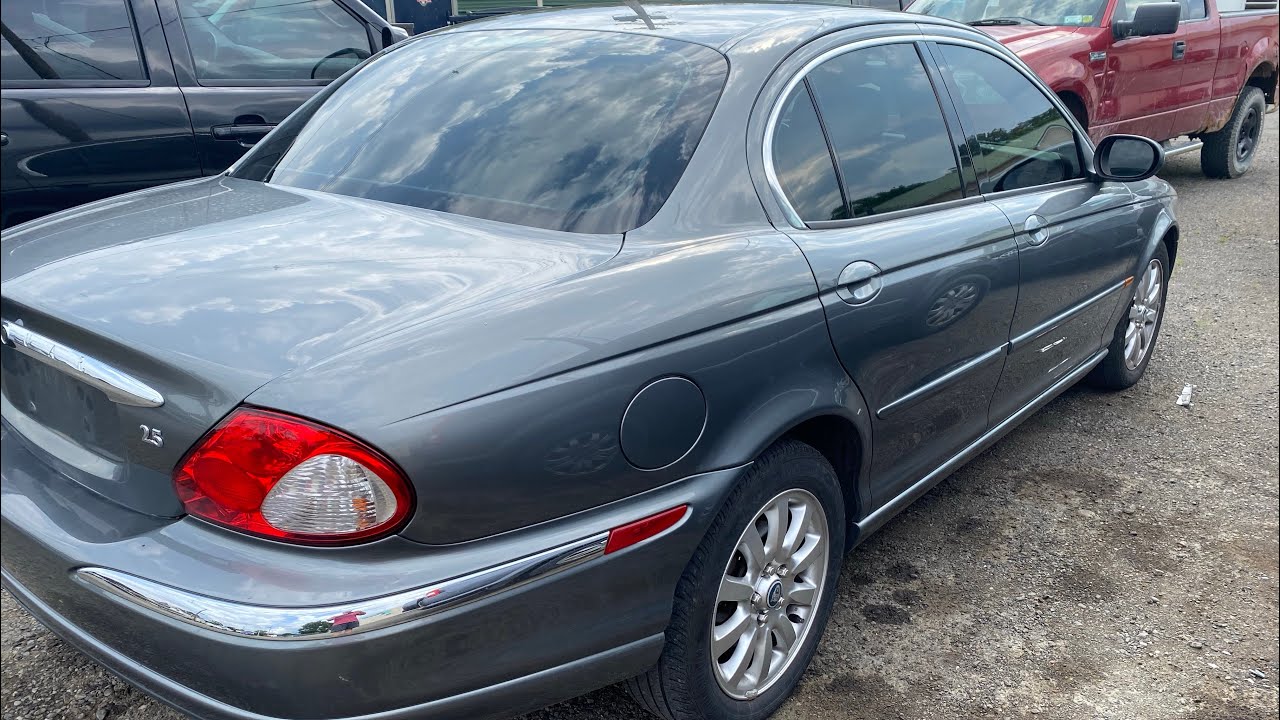 Как снять: переднюю дверную панель Jaguar Xtype 2002 года