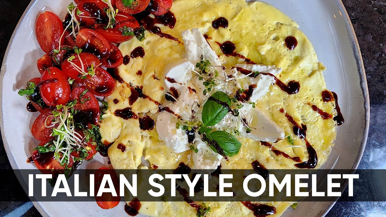Italian omelet with tomatoes, balsamic burrata and pesto