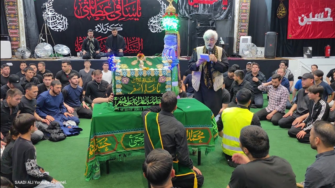 مراسم عزاداری و گهواره آوردن گهواره ی کودک شیر خوار حضرت علی اصغر حسین(ع) شب تاسوعای حسینی. Sweden
