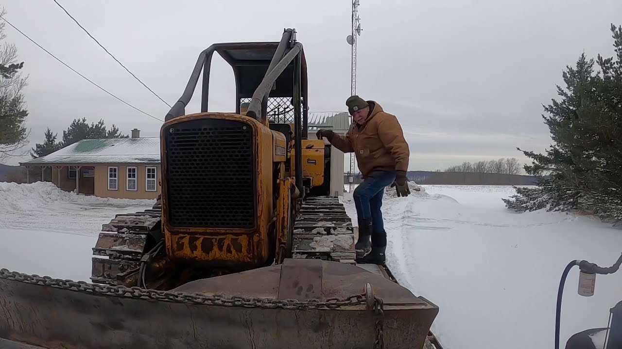 Cool day to move a 350 John Deere!