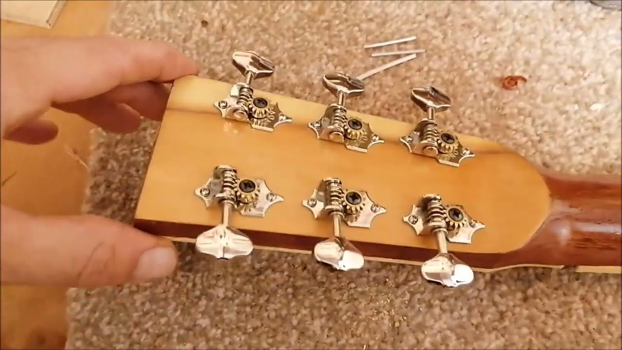 Florentine Cutaway 10 I glue the neck, bridge & frets on