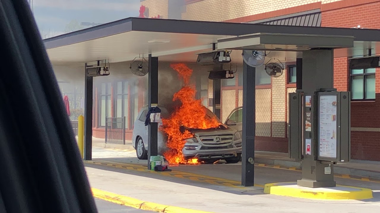 Mercedes bursts into flames at Chick Fil A Drive thru.