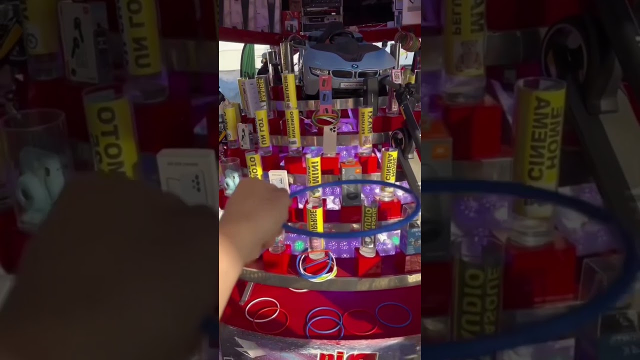 Comment mettre l’anneau autour du tube à la fête foraine ?