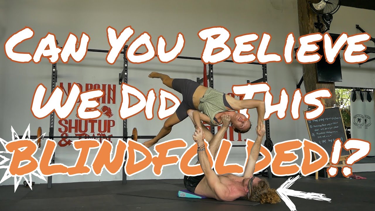 He&rsquo;s blindfolded and still balancing her on his feet! &ndash; The Acroyoga Show blindfold flow