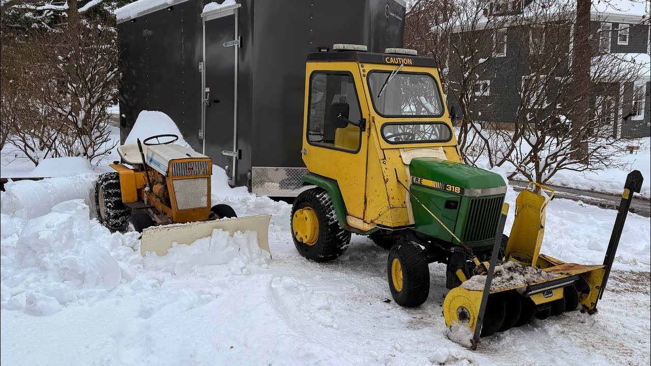 John Deere 318 and Cub Cadet 105 clearing the first winter storm in the Chicagoland area 8”-10”