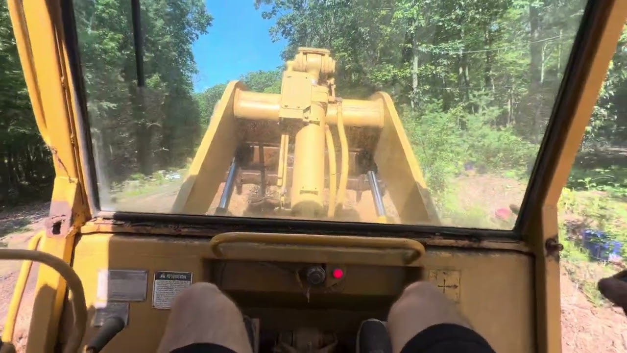 CAT 953 Track Loader Pushing HUGE Pile of Wood Chips