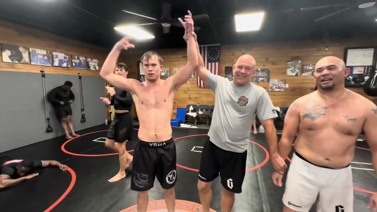 Shirtless Asian With Belly Fights Blue Belt in Jiu Jitsu
