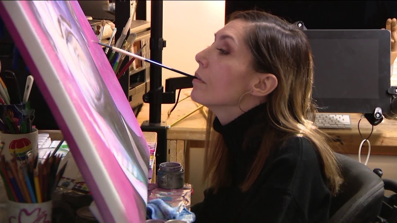 Artist paralyzed by bullet paints intricate designs with a brush in her mouth