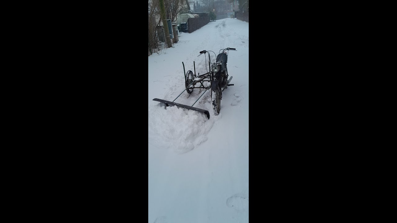 Snow plowing and log transportation by moped Delta (Riga-24) ( V-501)