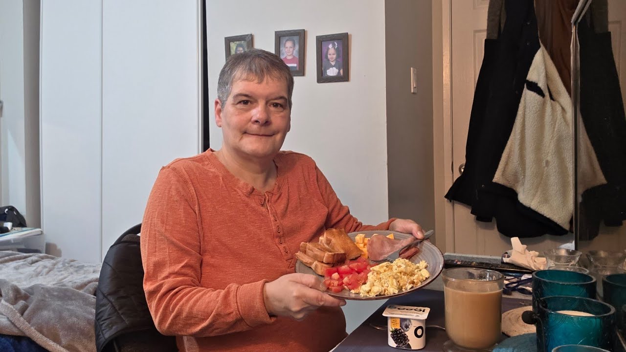 Morning chat with Scrambled Eggs Ham yogurt tomatoes cheese n Coffee 