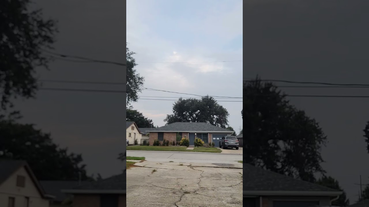 Cars driving down the street