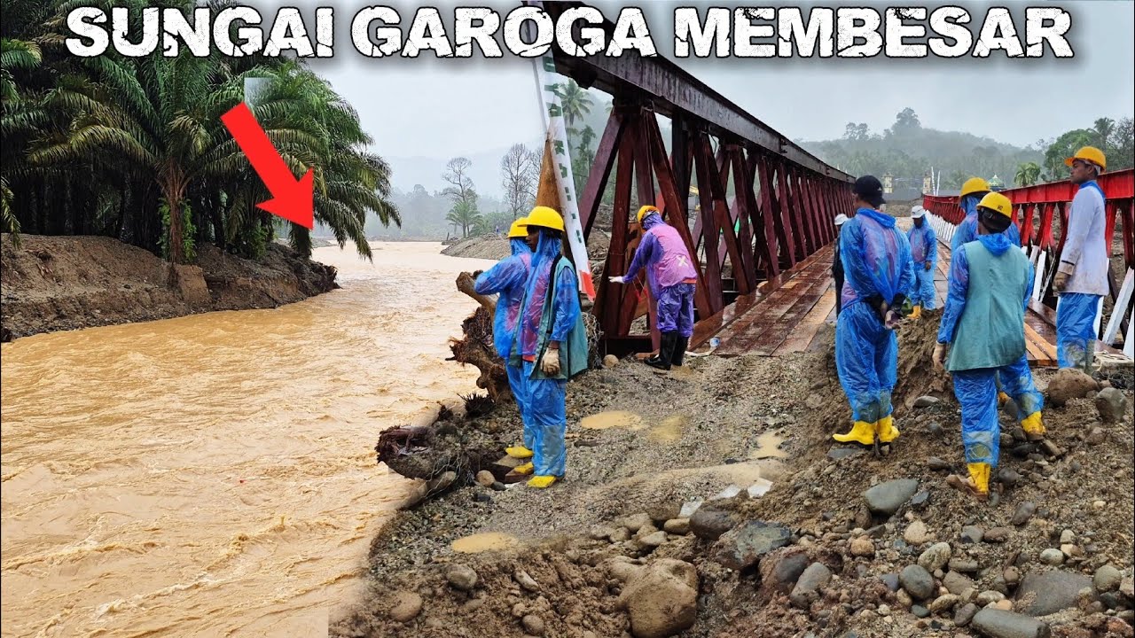 DESA GAROGA DI GUYUR HUJAN DESAR, BAHU JALAN MENUJU JEMBATAN BAILEY MASIH TAHAP PENIMBUNAN