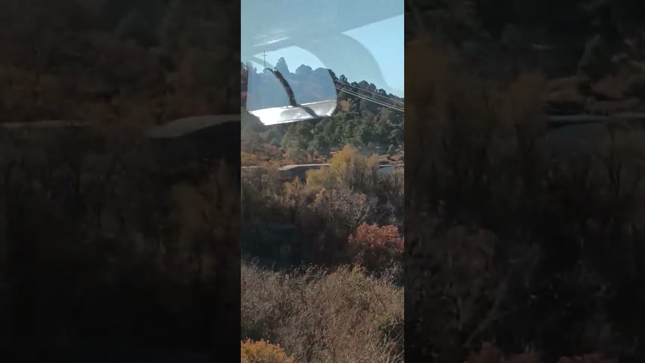 Metrolink cars on Amtrak Southwest Chief headed west  going up Raton