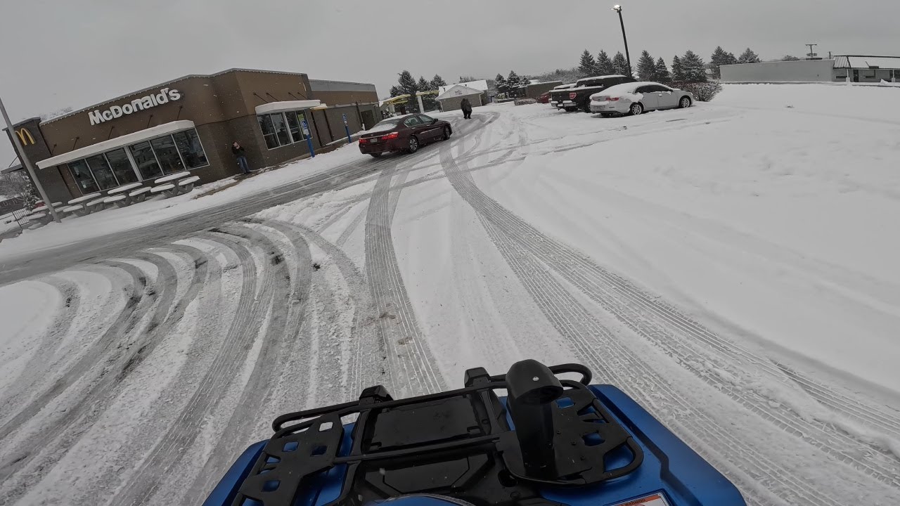 Riding my new 4 wheeler to Mcdonald's in the snow!