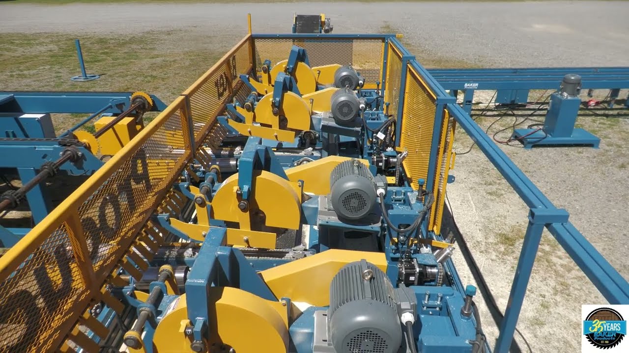 New! Baker Products Automated Trim, Split, Resaw and Notcher line with New! Automated Stacker.