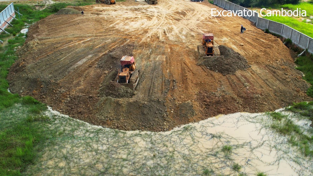 Oldest Bulldozer Working Moving Soil To Pond Filling Up 1 Acre  - Team Dump Truck Unloading Soil