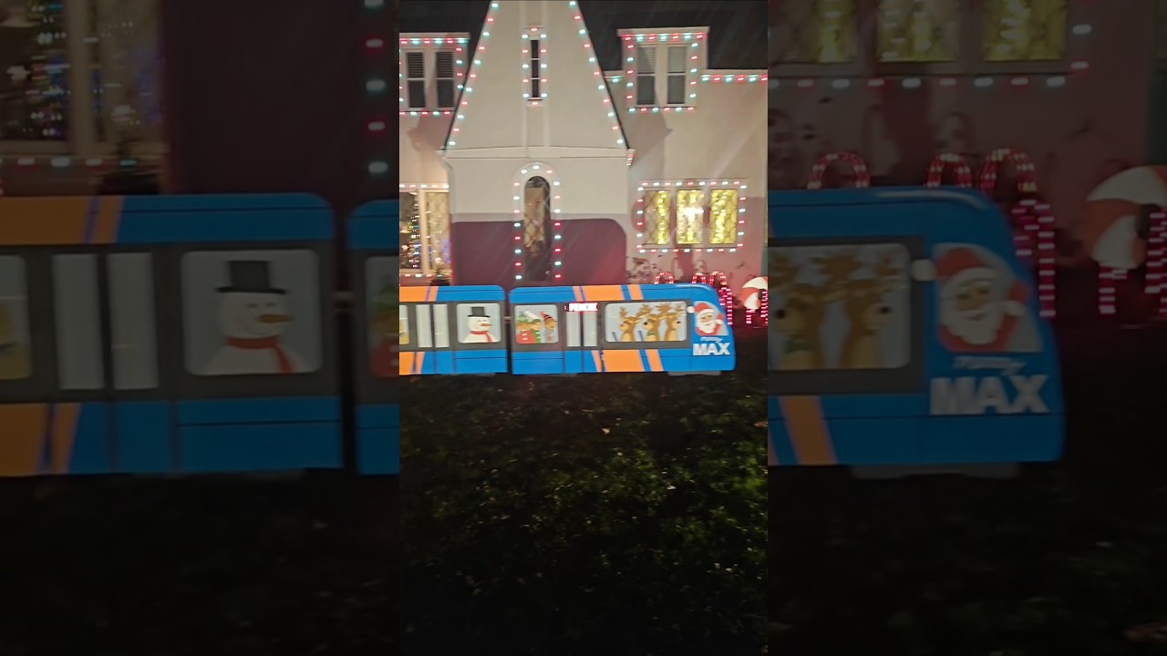 MAX Trimet in Peacock lane Christmas Lights. Portland, Oregon
