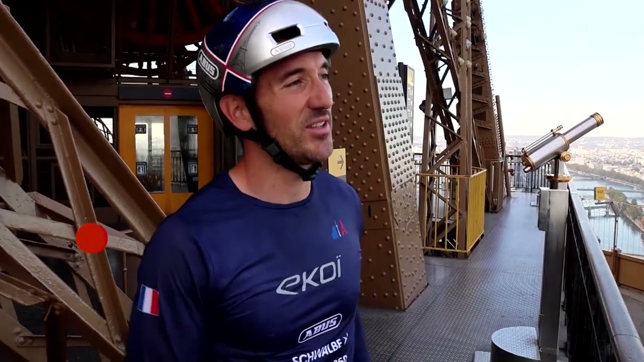 French cyclist bikes up Eiffel Tower in record-breaking climb | REUTERS