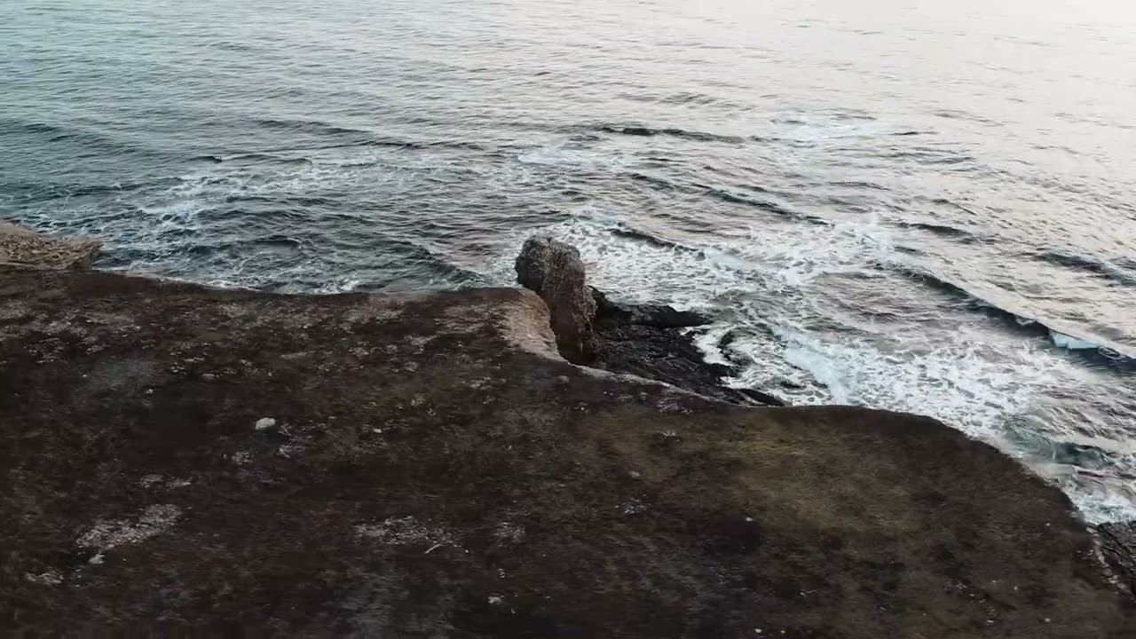 Cliffside Majesty: Aerial View of Coastal Cliffs 🌊🚁✨