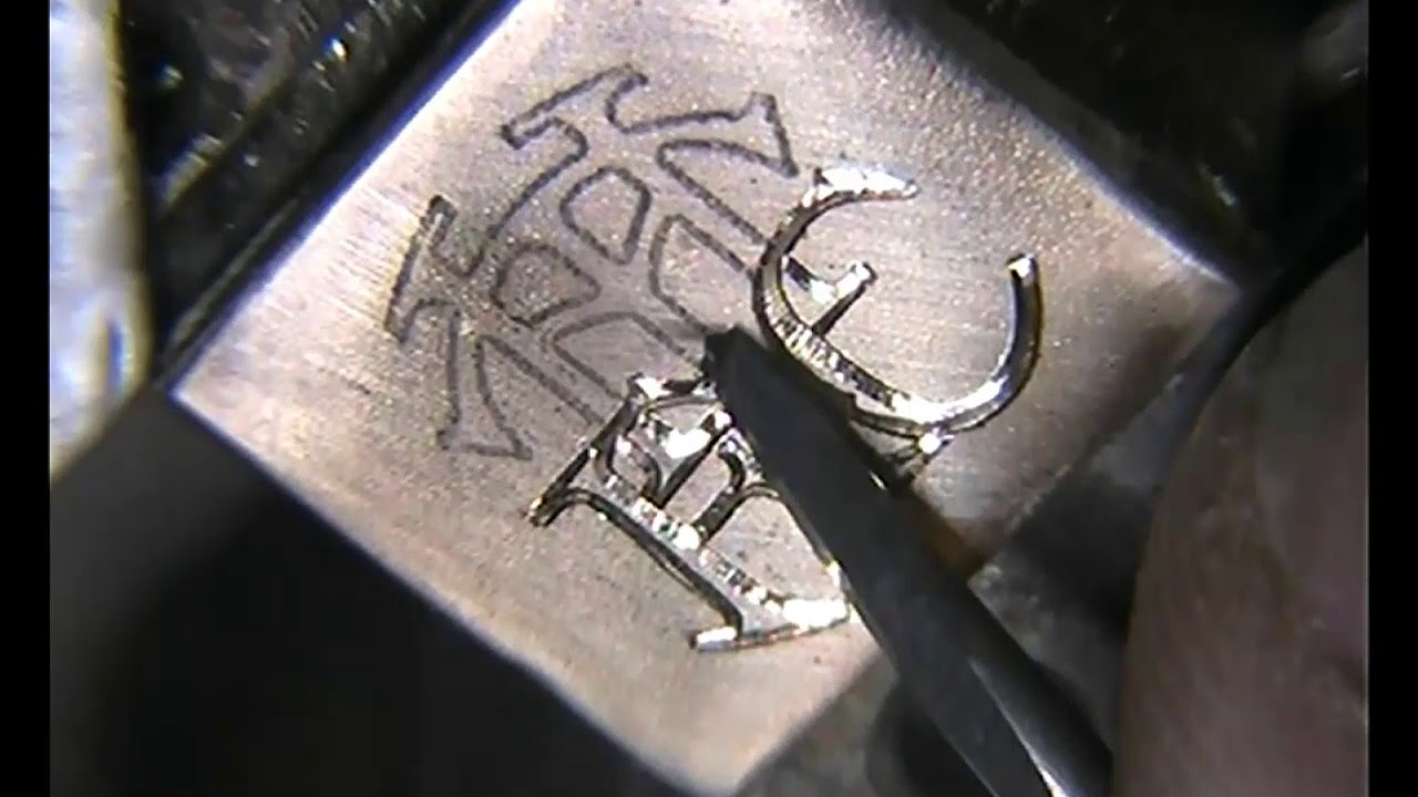 Hand Engraving an 18ct Gold Monogram Ring