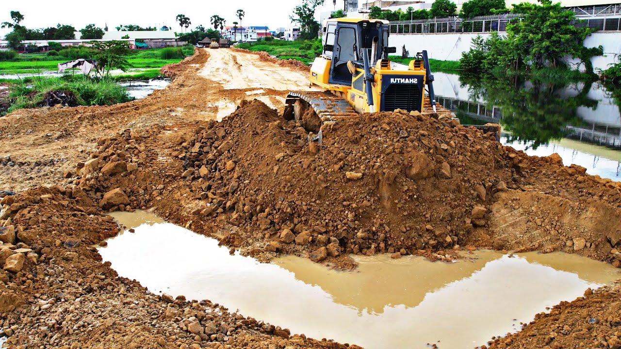 Wonderful Landfill Flooding Block by SHANTUI DH17 C2 Bulldozer Pushes soils with Dump Trucks loading