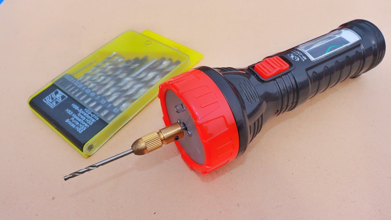 How to make a drill machine with old flashlight
