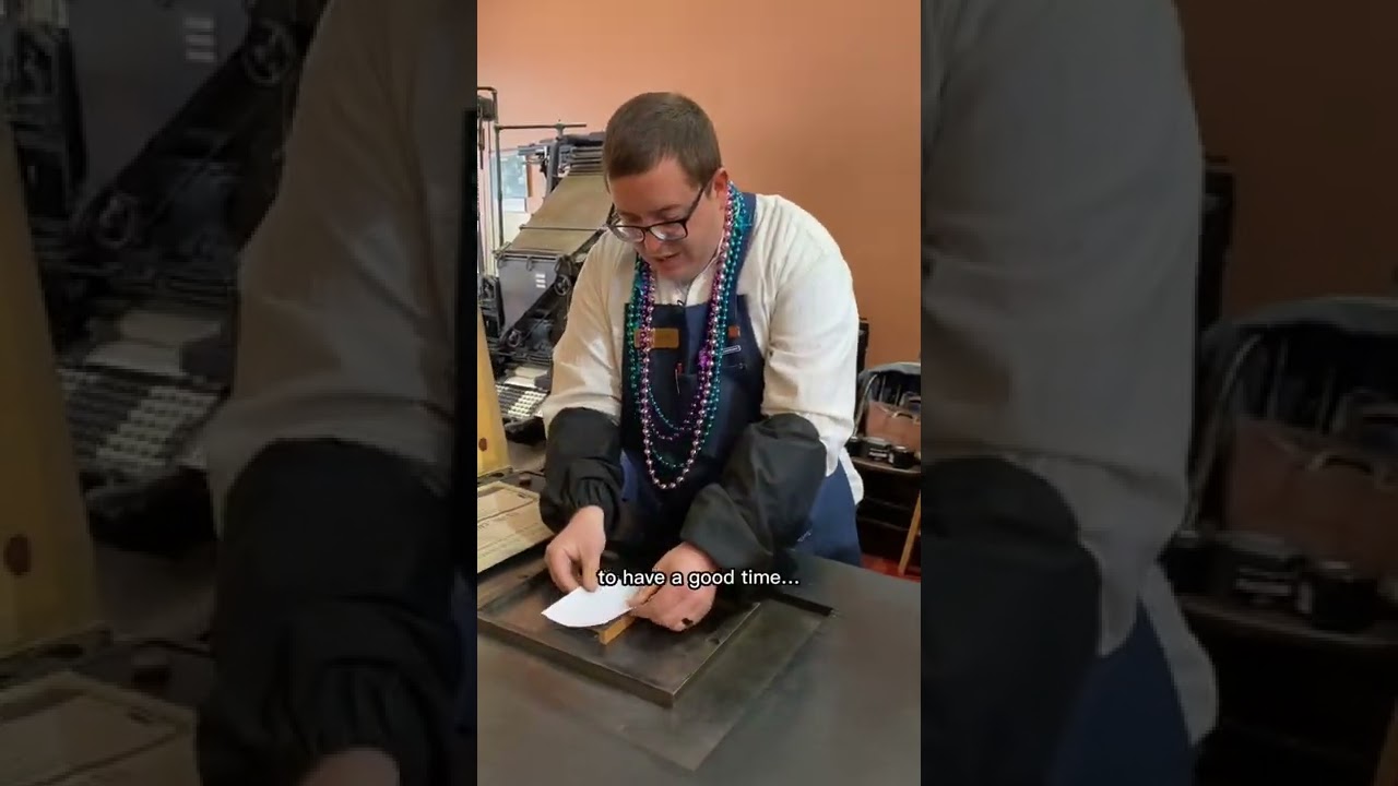 March 1 - Mardi Gras: Beads can be a little troublesome while operating a 170 year old hand press.