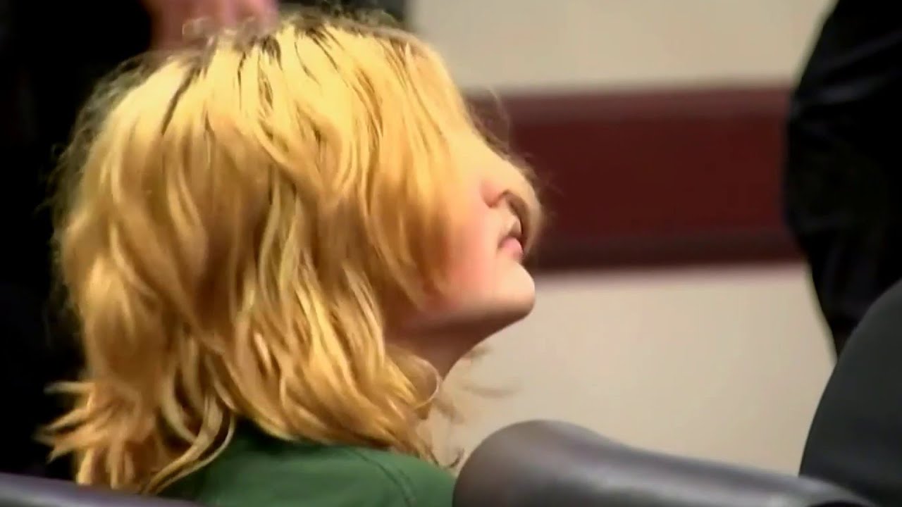 Teen charged in Georgia school shooting and his father to stay in custody after hearings
