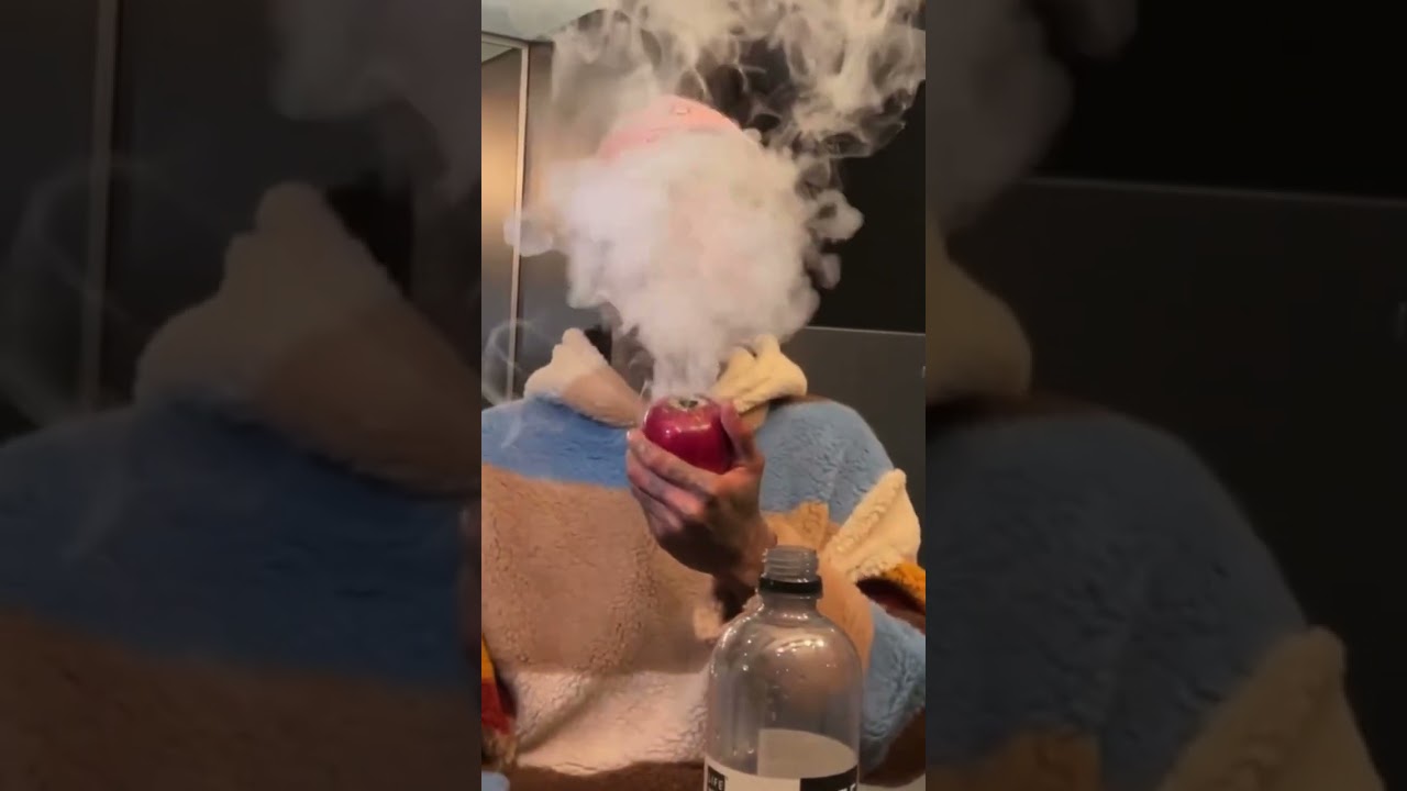 Wiz Khalifa smoking out of the Apple 🍎