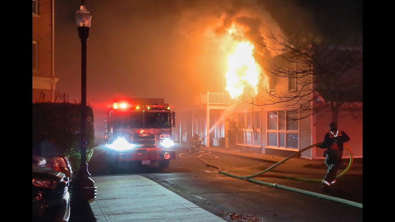 * WATCH * CREWS BATTLE HEAVY FLAMES FUELED BY STRONG WINDS AFTER HYANNIS BUILDING IGNITES