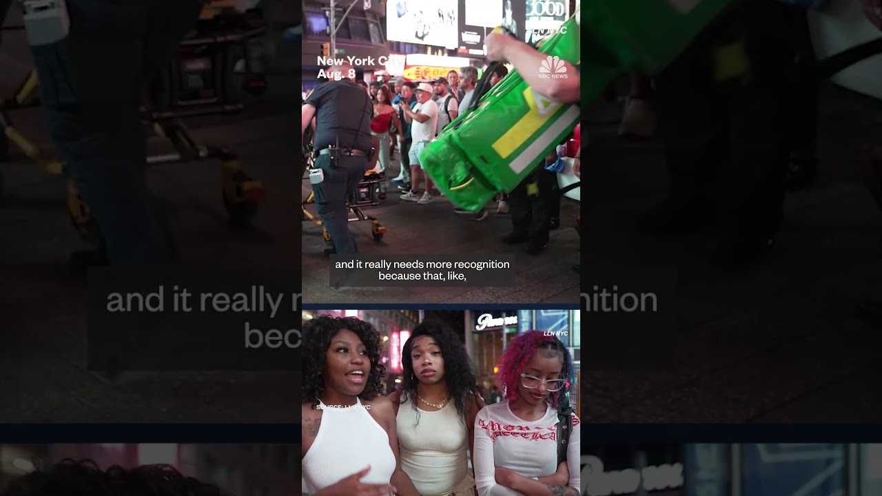 Tourists react after three people injured in Times Square shooting