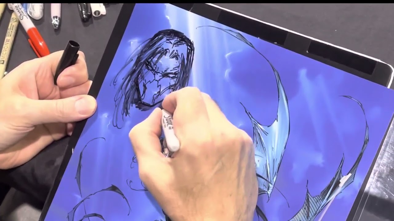 Marc Silvestri sketching the Darkness at Fan Expo Chicago 2022