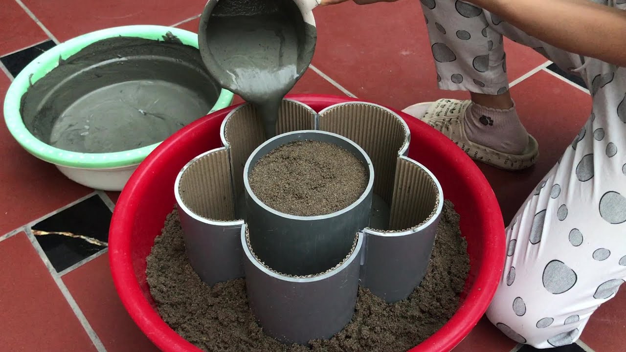 Extremely beautiful and unique cement flowers made from used Cardboard