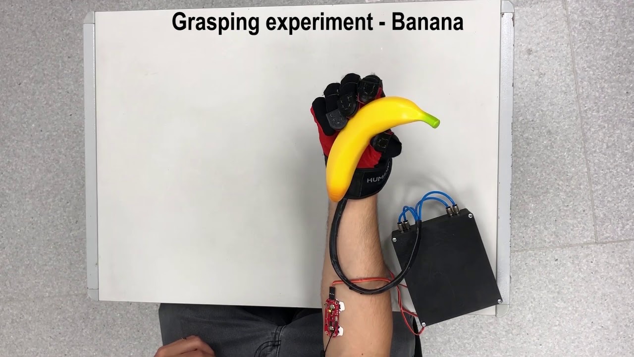 An Underactuated, Tendon-Driven, Wearable Exo-Glove With a Four-Output Differential Mechanism