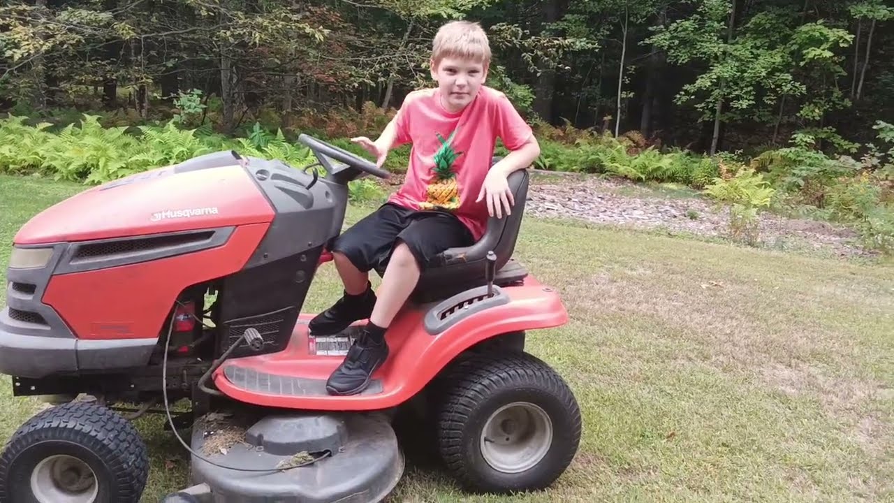 Us driving the lawn mower