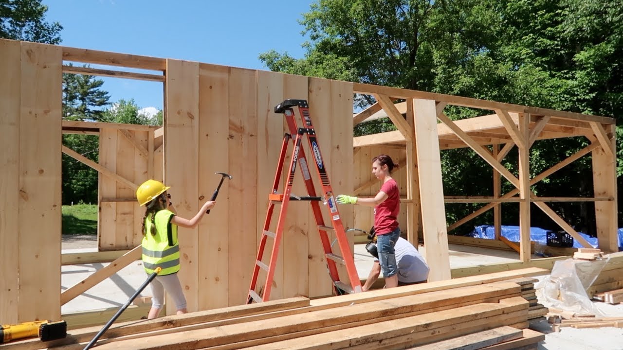 Family of 3 BUILDS POST and BEAM BARN Kit ordered off the INTERNET