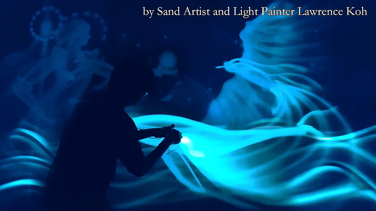 Light Drawing Performance by Sand Artist & Light Painter Lawrence Koh from Singapore
