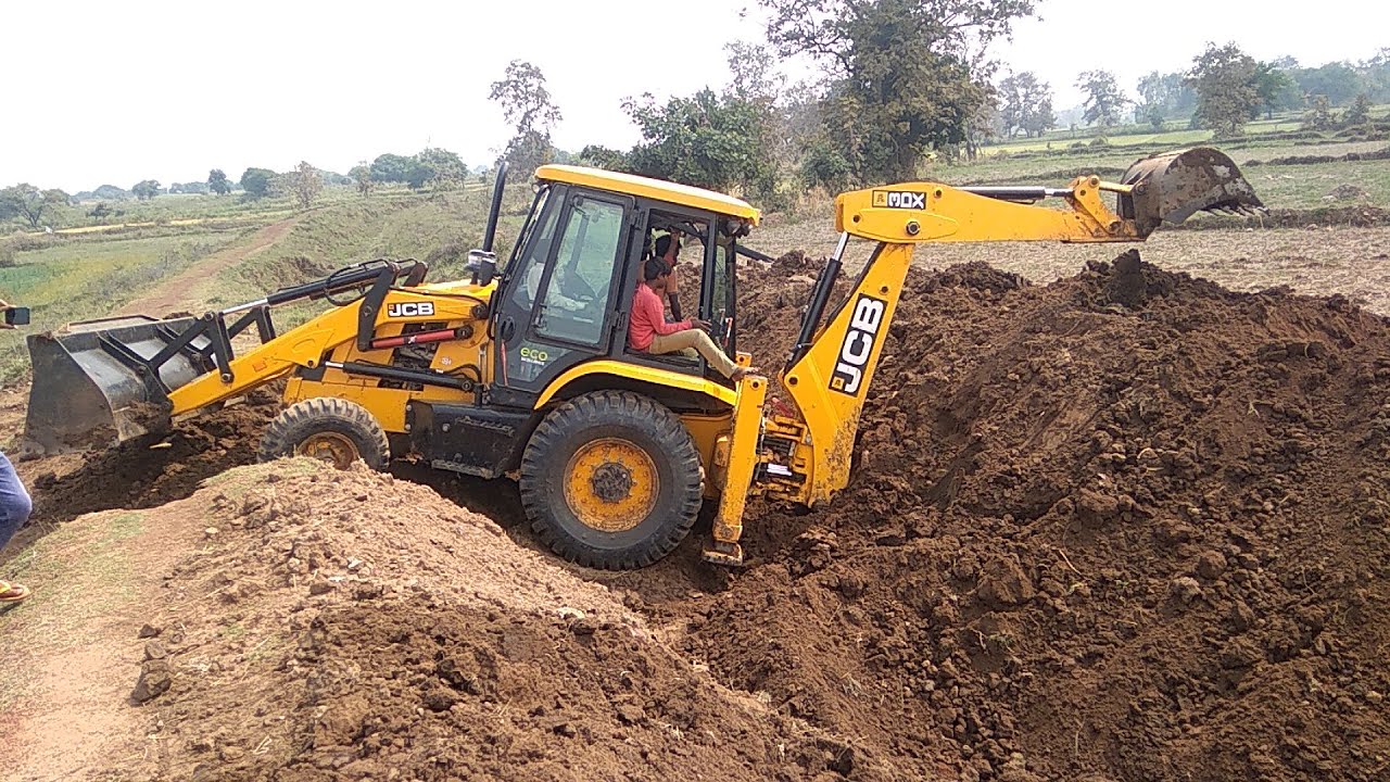 JCB Backhoe Machine Making Drain in The Various Vehicles Of Road To Install Culvert Pipe- JCB Video