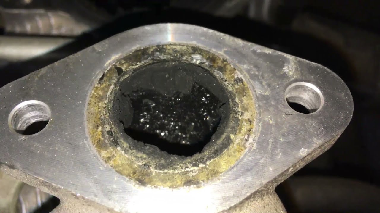 Does This intake manifold need cleaning and where does the EGR flow reduction plate go and why