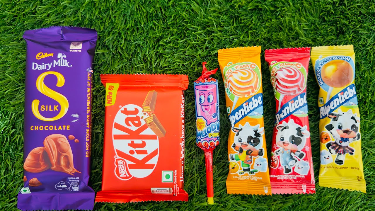 Satisfying video Asmr lollipops candy and chocolate unboxing video 