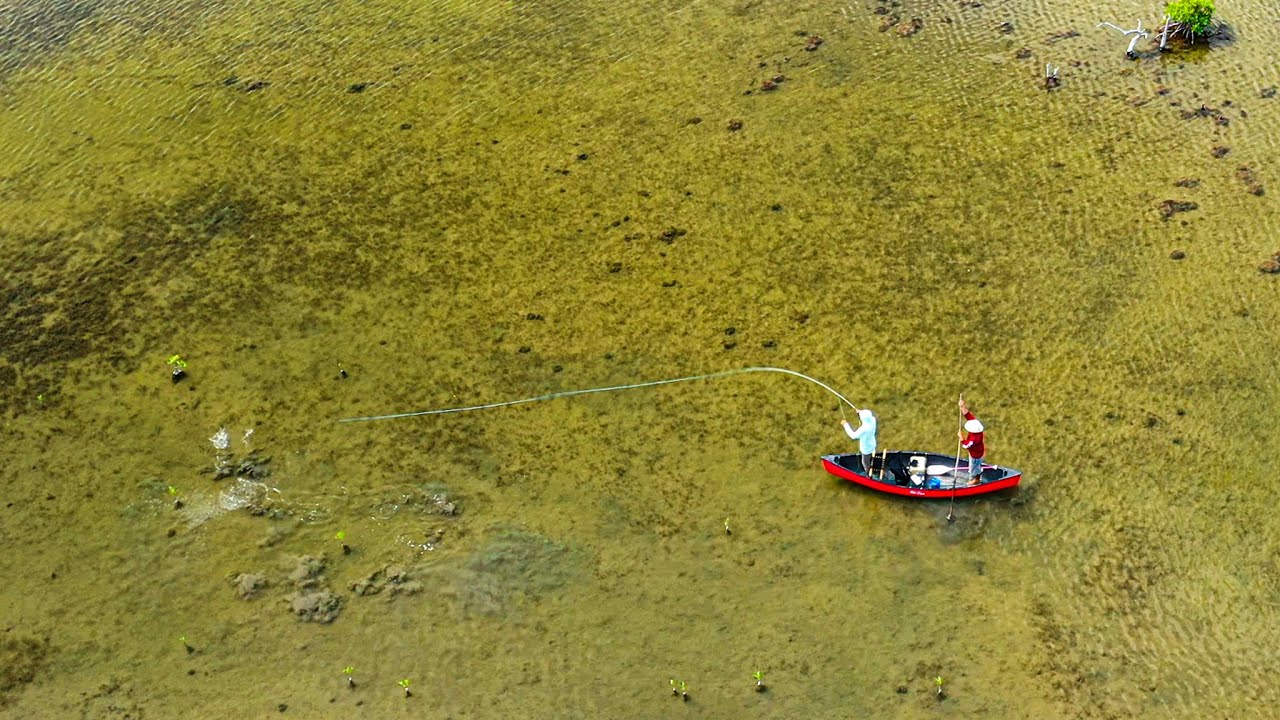 Fly Fishing Bonefish from a Tiny Canoe in Belize