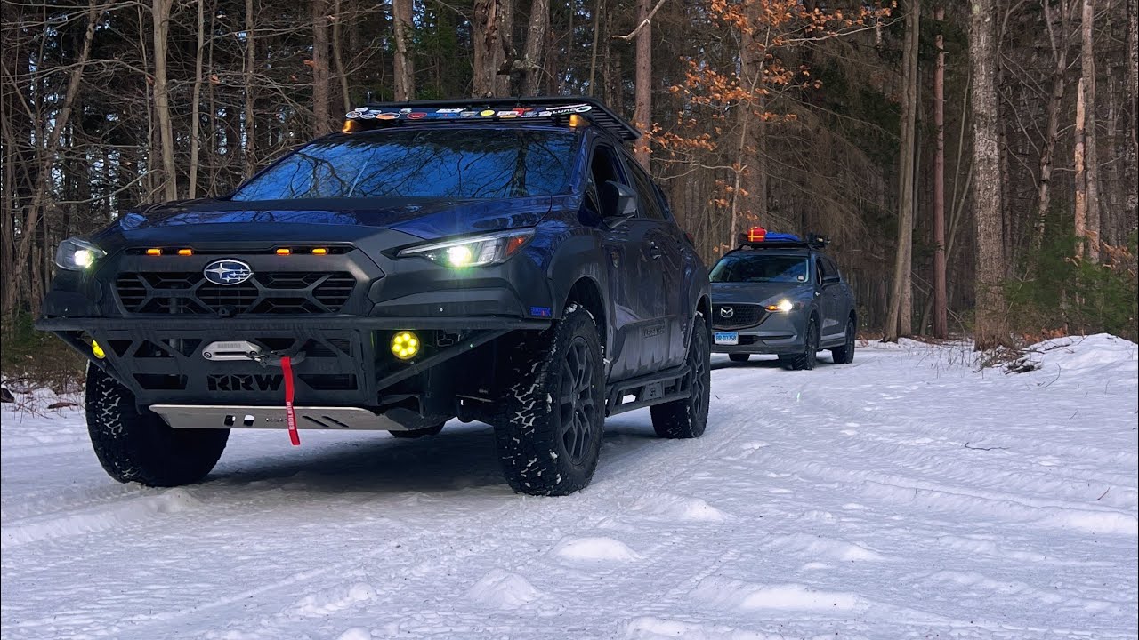 Subaru Crosstrek Wilderness and Mazda CX5 on Snowy Trails