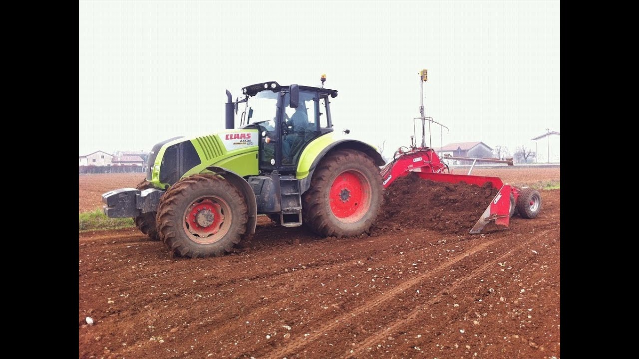 Livellamento terreno 2014 Claas Axion 810 e Livella laser Rossetto 5 metri