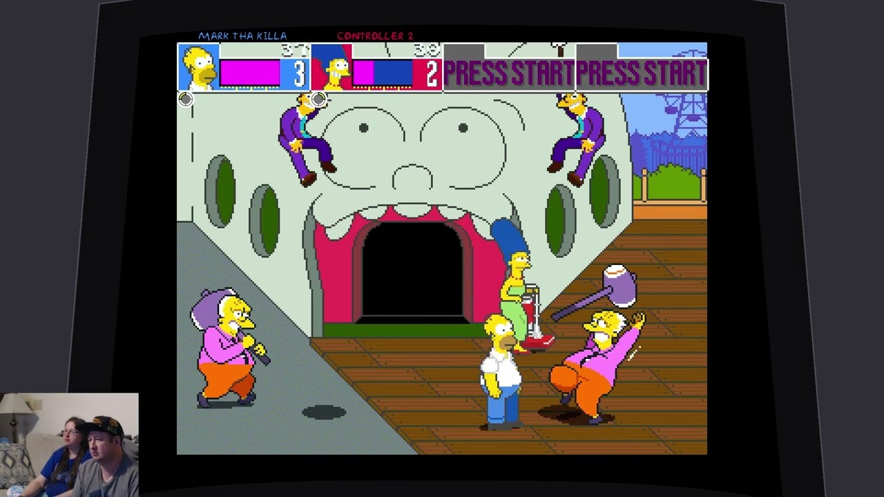 1.  Simpsons Arcade With Homer And Marge!