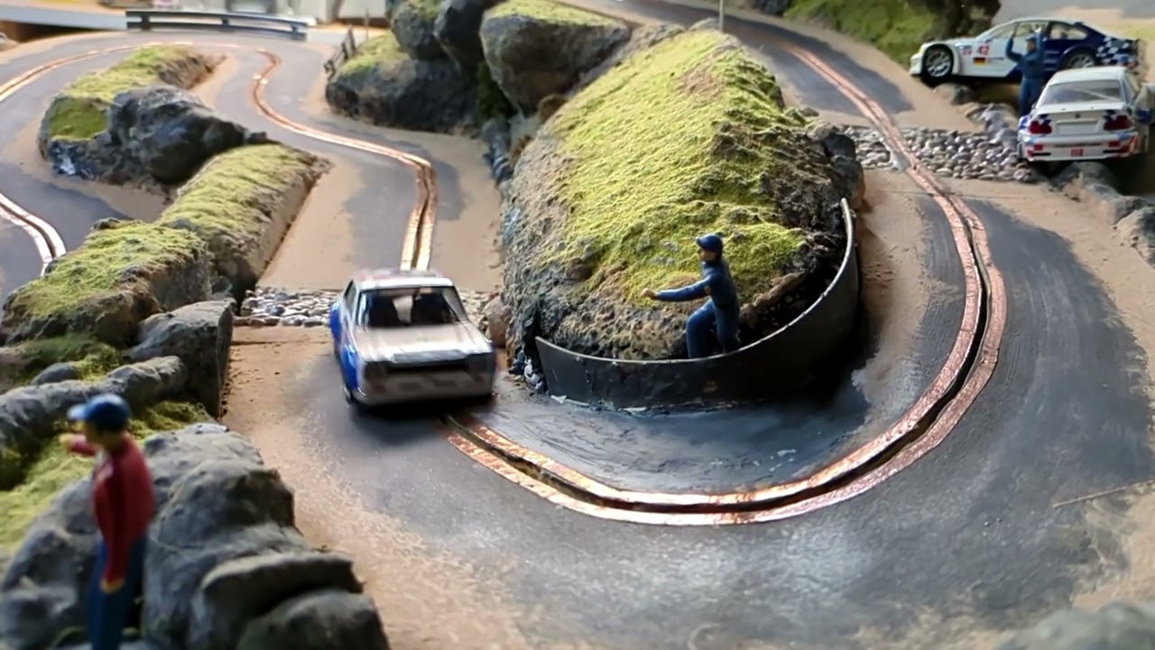 RevoSlot Escort slot cars take on the hill climb track