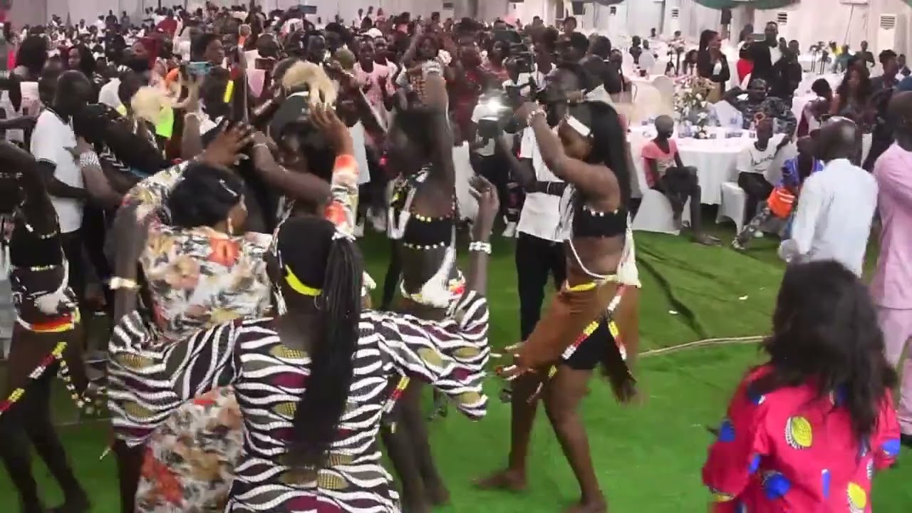 Deng Abuk performance during Akoc roads fundraising event in freedom hall