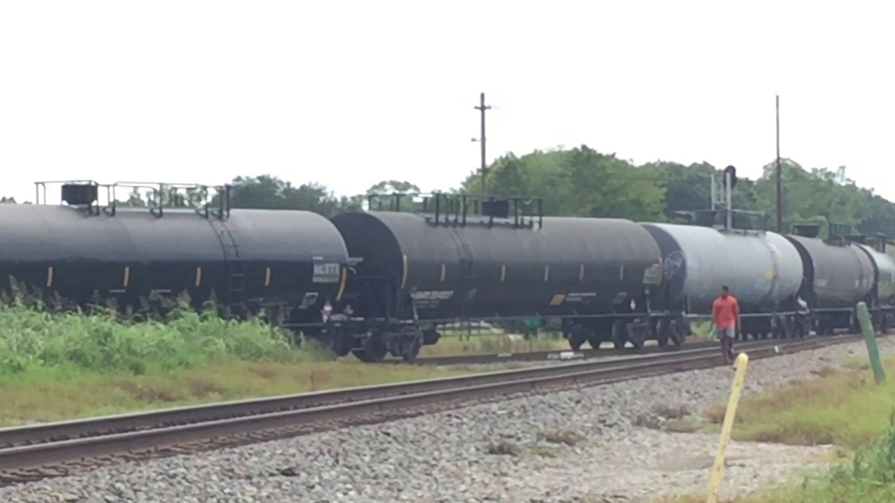 Stupid people doing stupid things. Freight train close call. Close call with a train.
