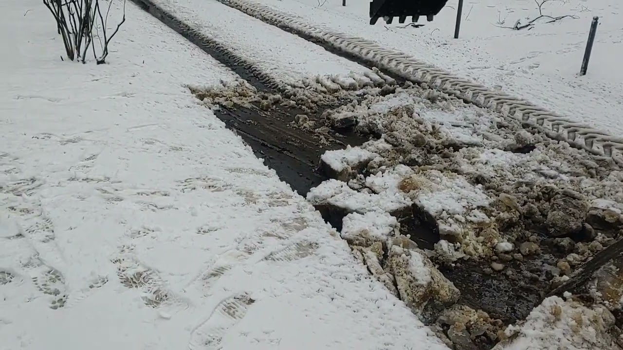 Explosion of ice. A genius way to remove ice — an excavator.